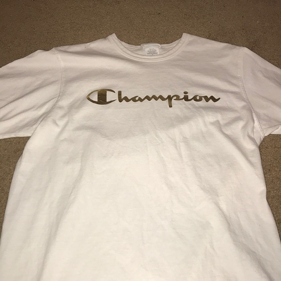 white and gold champion shirt